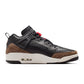 Men's Air Jordan Spizike Low sneakers in black and university red, featuring a stylish low-top design with Nike branding.