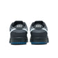 Nike Men's Dunk Low Pure Platinum sneakers, denim exchange branded footwear with sleek silver and white design, shown from side view.