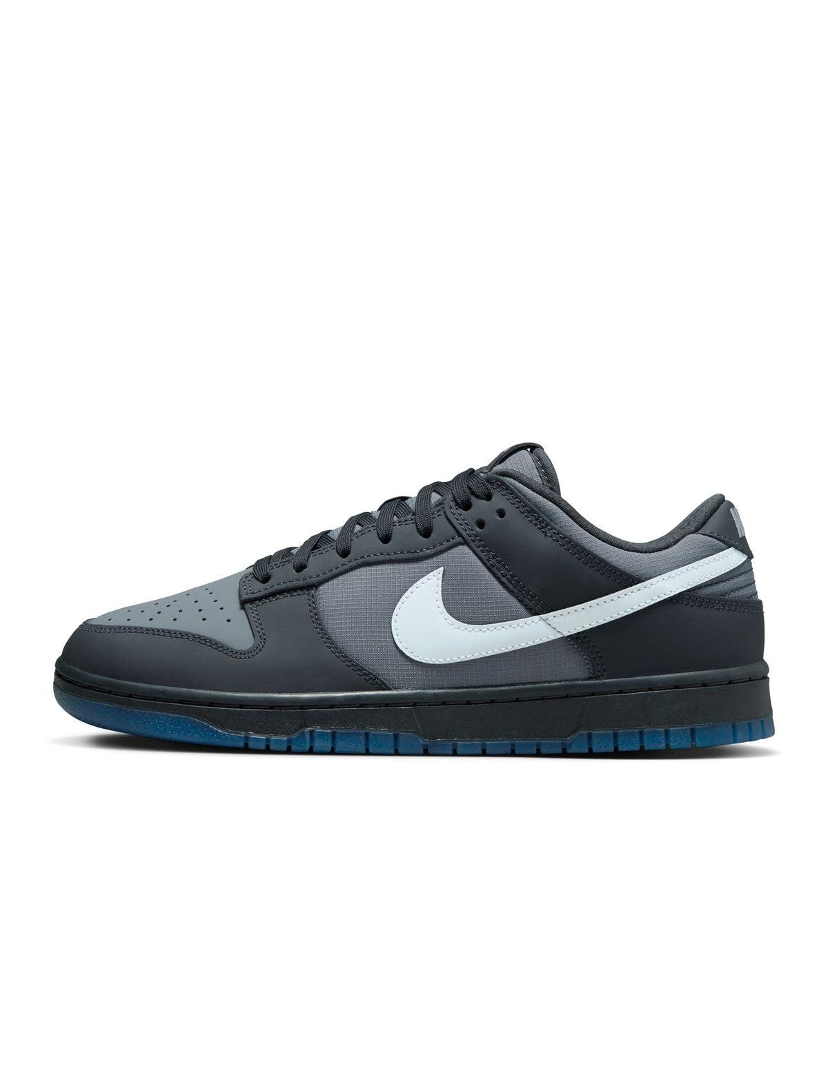 Nike Mens Dunk Low Pure Platinum sneakers, side view showing sleek design and light gray color, casual men's footwear.