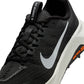Nike Men's Wildhorse 10 black and wolf grey men's footwear, side view sneaker