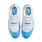 Men's Air Jordan 11 Retro Low University Blue footwear by Denim Exchange, featuring a blue and white design with signature style.