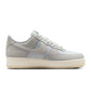 Nike men's Air Force 1 '07 LV8 sneakers in light smoke grey, side view