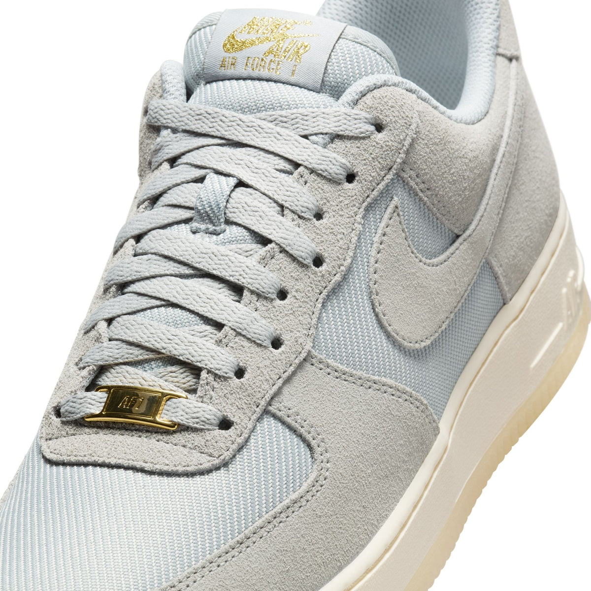 Nike Men's Air Force 1 '07 LV8 sneakers in Light Smoke Grey, side view