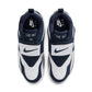 Nike men's Air Diamond Turf Cowboys sneakers, showcasing navy and white athletic footwear with Nike branding and retro design.