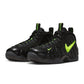 Nike Men's Air Foamposite Pro black and Voltage sneakers, showcasing the sleek design and bold color accents.