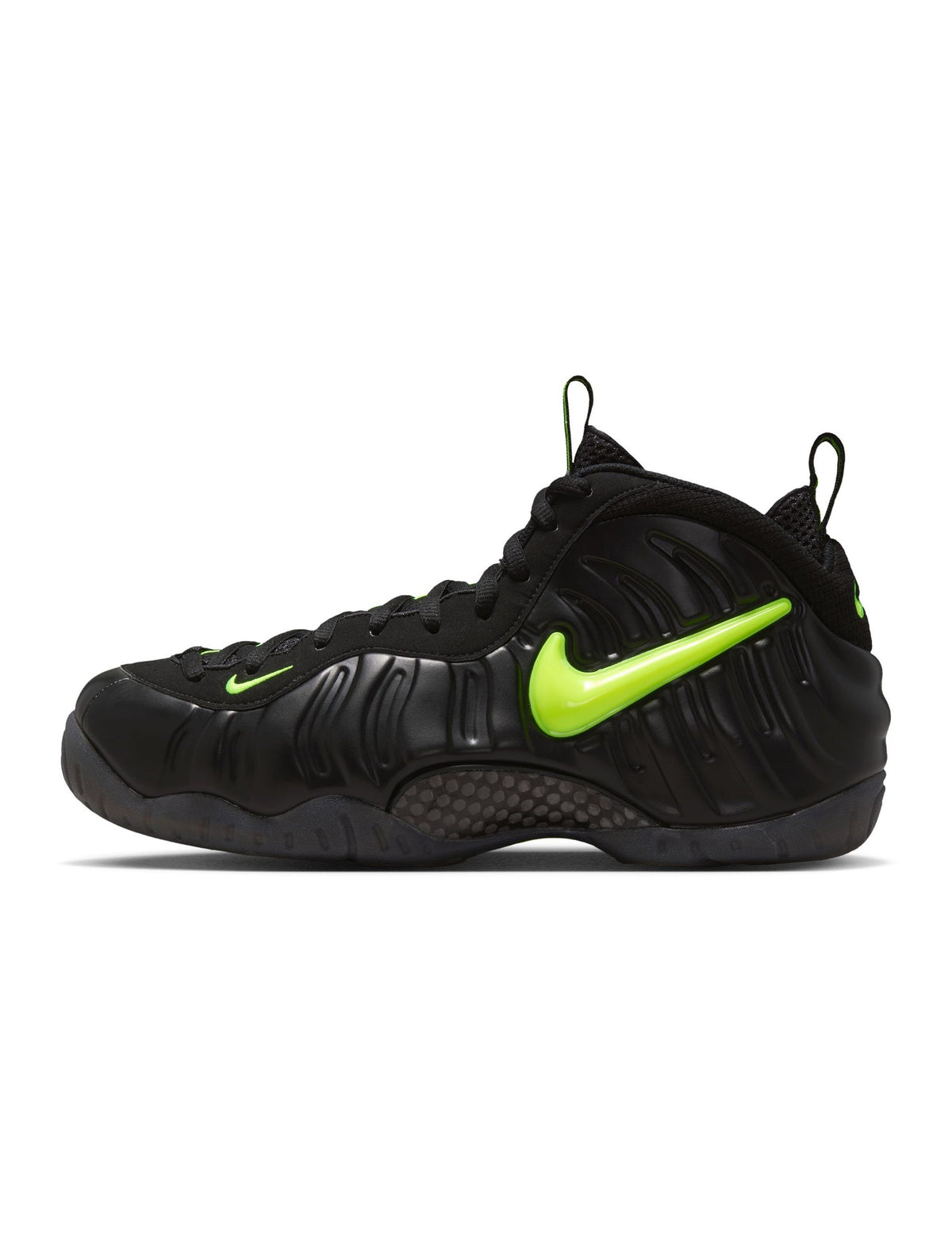 Nike men's Air Foamposite Pro sneakers in black and voltage, showcasing a sleek design with bold color accents.