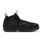 Nike men's Air Foamposite Pro sneakers in black and Voltage colorway, featuring a sleek design and bold color accents.