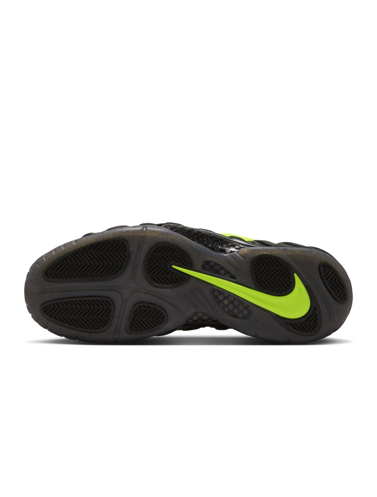 Nike men's Air Foamposite Pro sneakers in black and Voltage, showcasing the sleek design and textured upper.