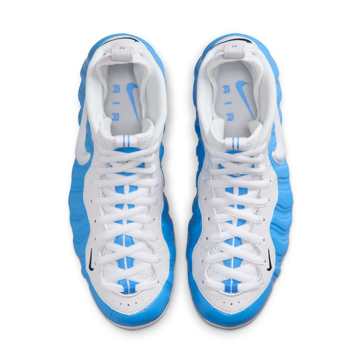 Nike Men's Air Foamposite Pro University Blue sneakers, showcasing the sleek blue and black design with textured upper.
