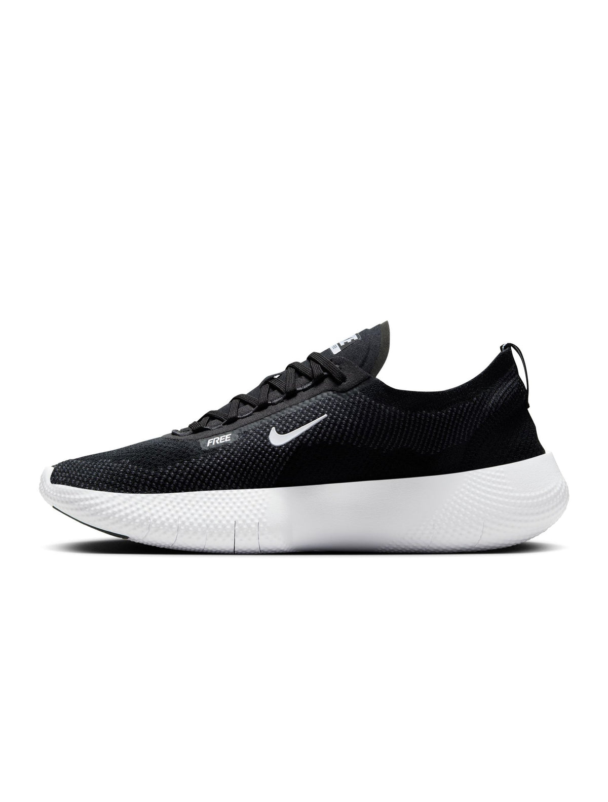Nike Men's Free 2025 black and white athletic sneakers with breathable mesh and flexible soles.