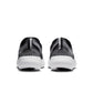 Nike men's Free 2025 sneakers in black and white, athletic footwear with breathable design and cushioned sole.