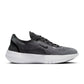 Nike men's Free 2025 black and white athletic footwear, shown in a sleek design with breathable mesh upper and cushioned sole.