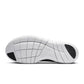 Nike men's Free 2025 black and white athletic footwear, stylish sneakers with breathable design and sporty look.