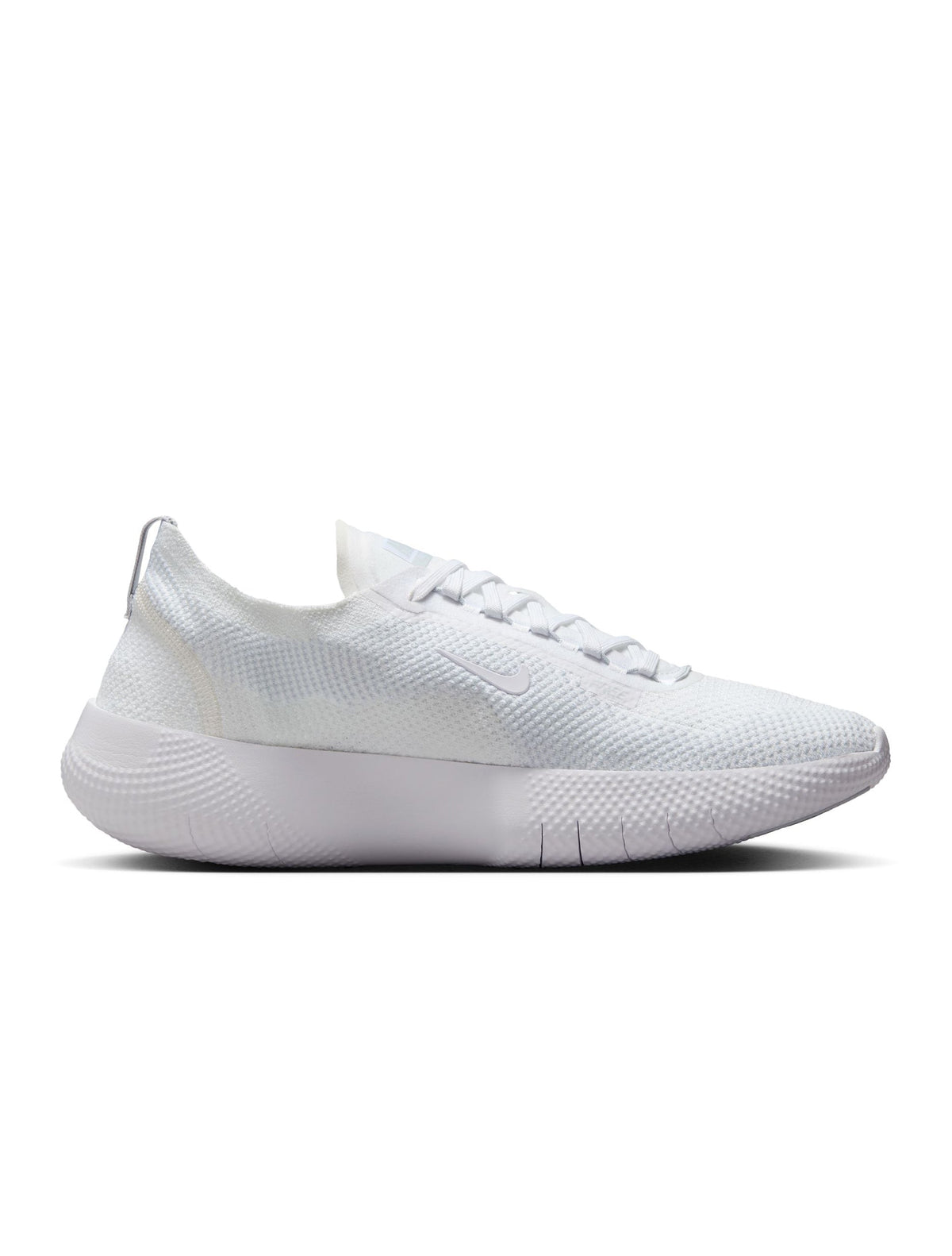 Nike men's Free 2025 white athletic shoes with breathable mesh upper and flexible sole, displayed on a neutral background.