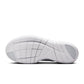 Nike men's Free 2025 white athletic footwear with breathable mesh upper and cushioned sole, displayed on a plain background.