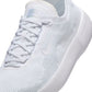 Nike men's Free 2025 white sneakers, lightweight athletic footwear with breathable mesh and cushioned sole.