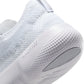 Nike men's Free 2025 white running shoes, lightweight athletic footwear, featuring breathable design and cushioned sole.