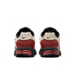Nike men's Zoom Vomero 5 sneakers in desert khaki and black with layered mesh and synthetic panels