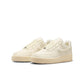 Nike Womens Air Force 1 Low Coconut Milk sneakers, white leather footwear with Nike swoosh and stylish design details.