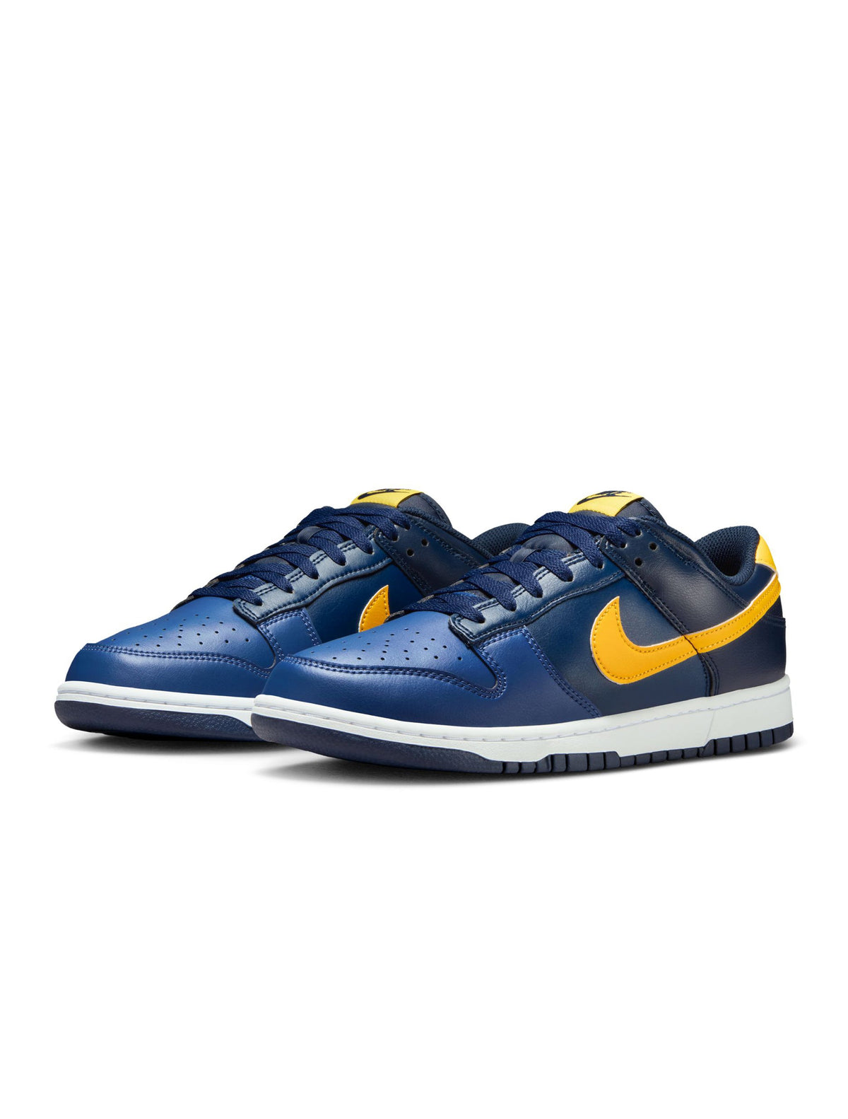 Nike Mens Dunk Low Retro Blue Legend sneakers in navy and white leather with white laces, showcasing classic athletic style.
