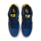 Nike men's Dunk Low Retro Blue Legend sneakers, featuring blue leather and white accents, on a neutral background.
