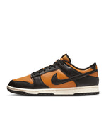 Nike Men's Dunk Low Retro Desert Ochre sneakers, side view in yellow and black leather panels