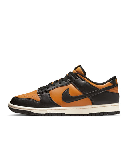 Nike Men's Dunk Low Retro Desert Ochre sneakers, side view in yellow and black leather panels