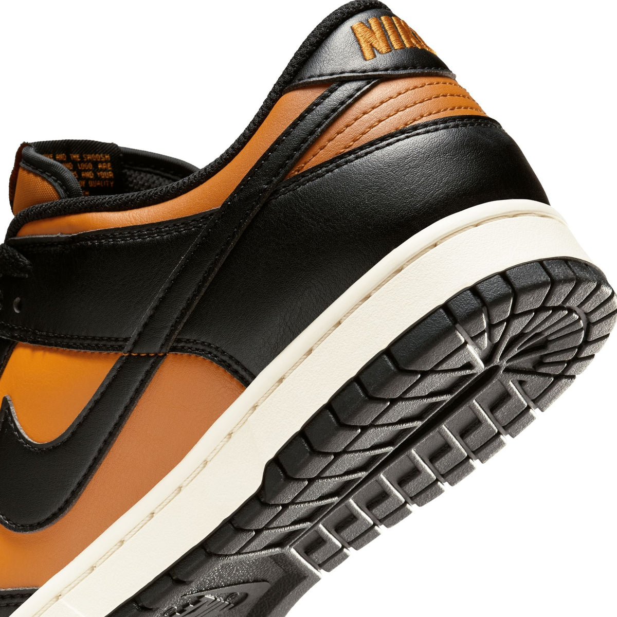 Nike Men's Dunk Low Retro sneakers in Desert Ochre colorway, side view
