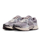 Nike Men's V5 RNR sneakers in cement grey, side view with textured upper and cushioned sole