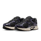 Denim Exchange Nike Men's V5 RNR sneakers in Off Noir, side view with black athletic design