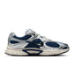 Nike men's V5 RNR sneakers in Blue Void, side view, featuring a low-top design and textured sole