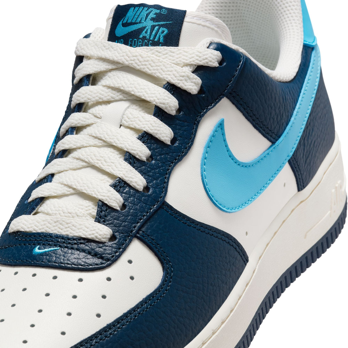 Nike men's Air Force 1 '07 sneakers in Armory Navy and Baltic Blue, side view