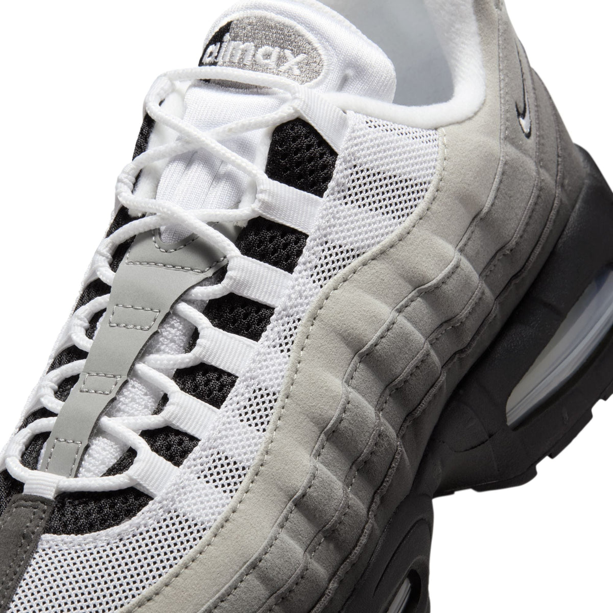Nike Men's Air Max 95 OG sneakers in black and medium ash with layered upper and visible Air cushioning