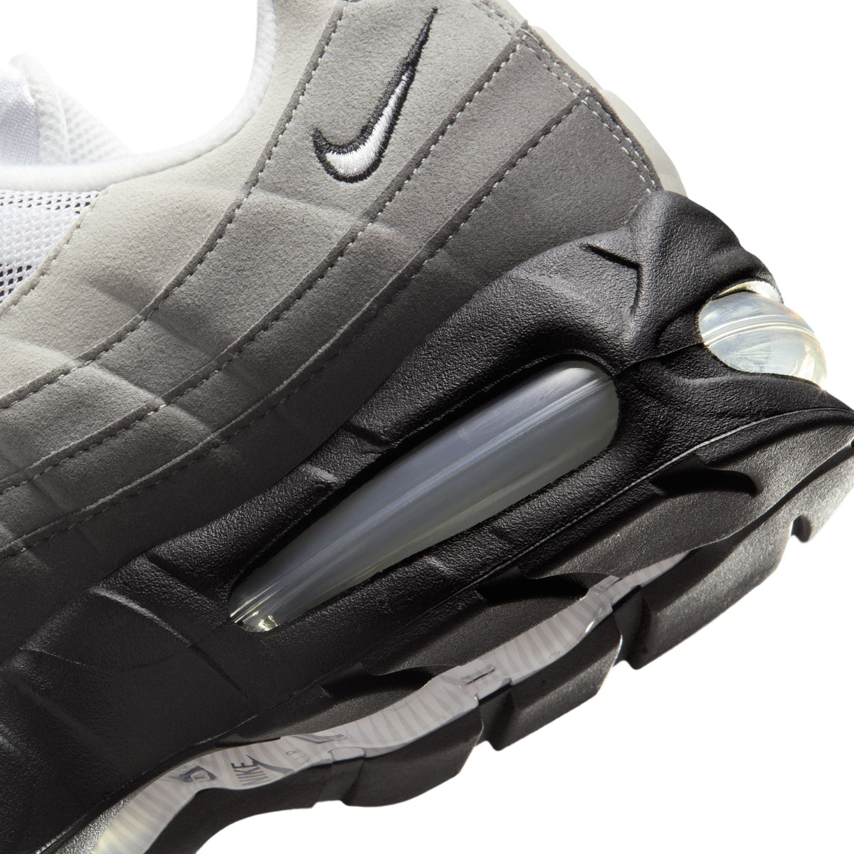 Nike Men's Air Max 95 OG sneakers in black and medium ash with layered panels and visible Air cushioning