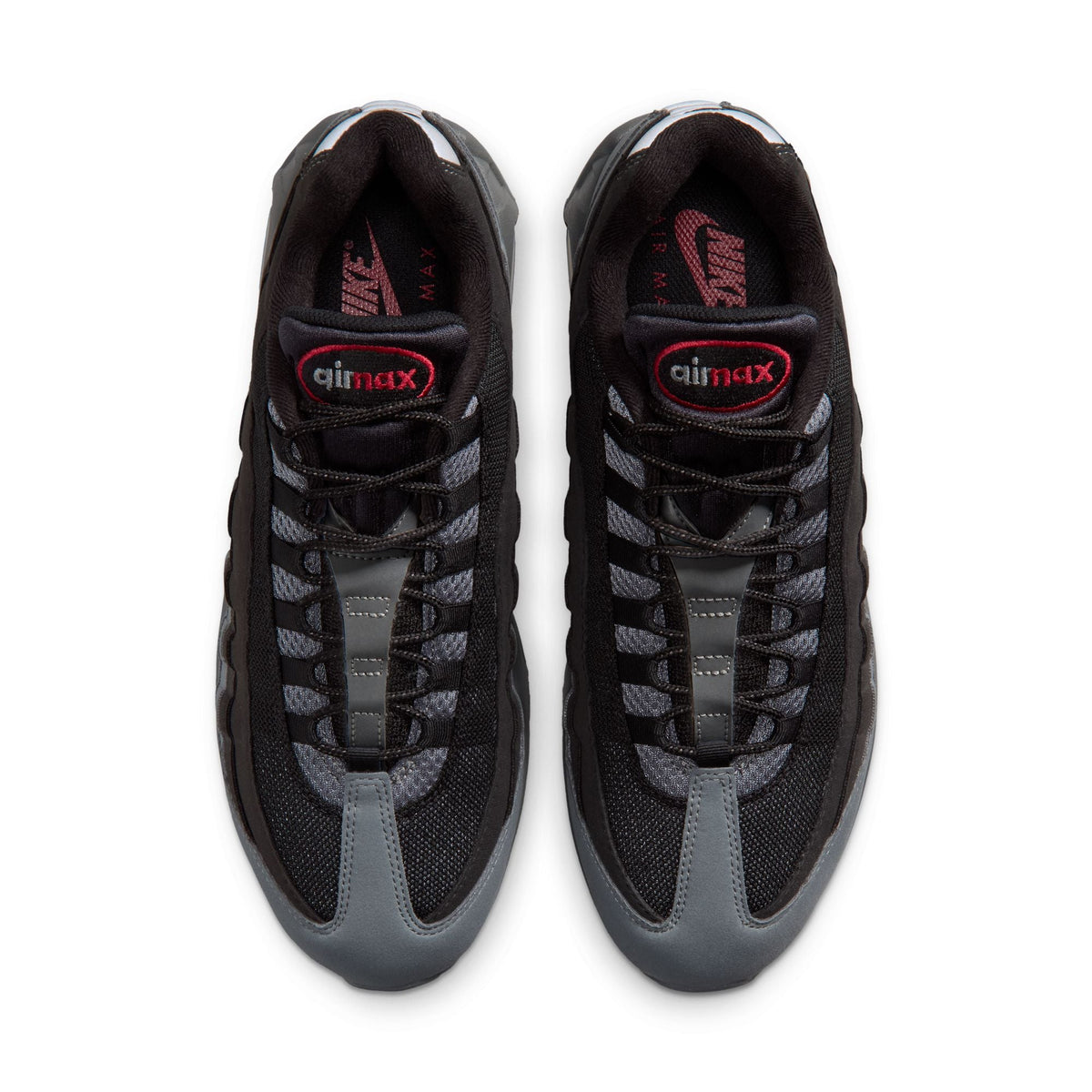 Nike Mens Air Max 95 Big Bubble OG sneakers in black and tough red, featuring visible Air Max cushioning and modern athletic design.