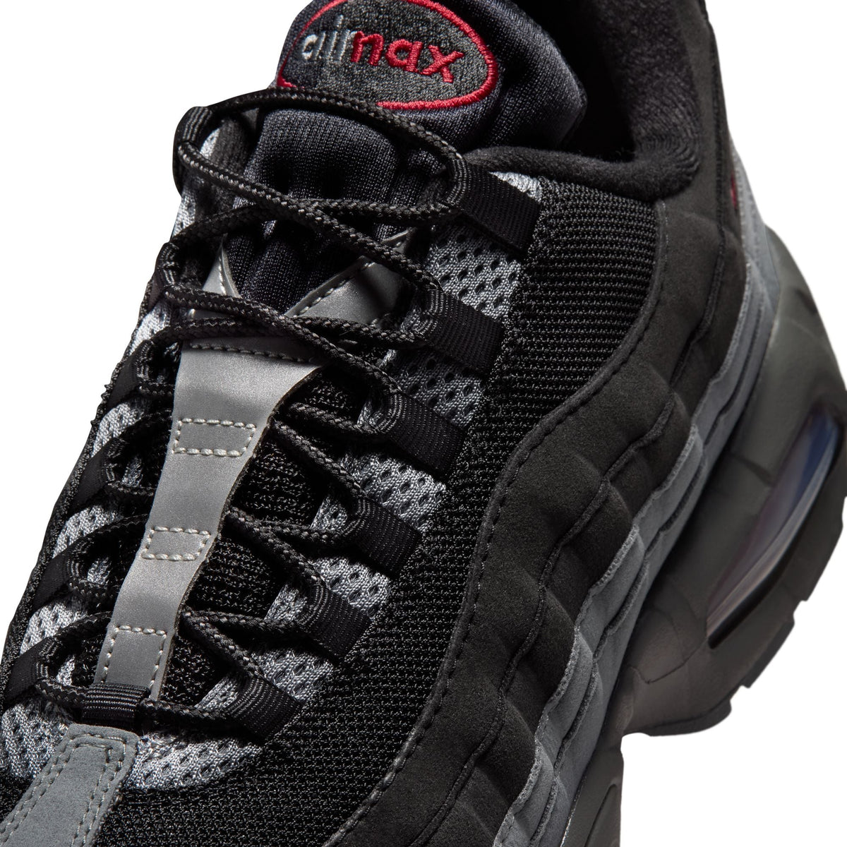 Nike Mens Air Max 95 Big Bubble OG sneakers in black and tough red, showcasing the iconic layered design and visible Air cushioning.