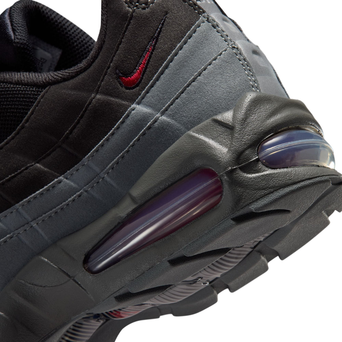 Black and tough red Nike Air Max 95 Big Bubble OG men's footwear with visible cushioning and sporty design.