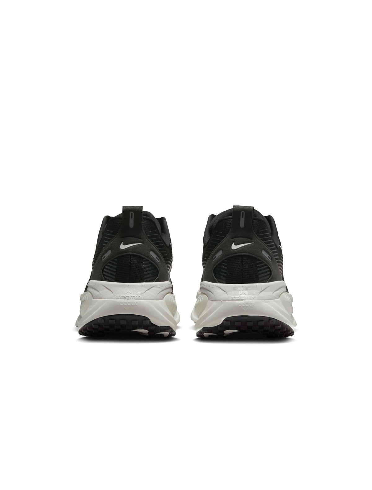 Nike men's Vomero 18 black and white running shoes, side view