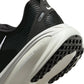 Black and white Nike men's Vomero 18 running shoes, side view