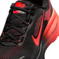 Nike men's Vomero 18 footwear in black and bright crimson, side view