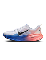 Nike Mens Vomero 18 running shoes in white and blue, featuring breathable mesh and cushioned soles for comfort.