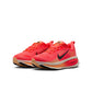 Nike Women's Vomero 18 running shoes in Hot Lava color, featuring lightweight design and breathable mesh for comfort.
