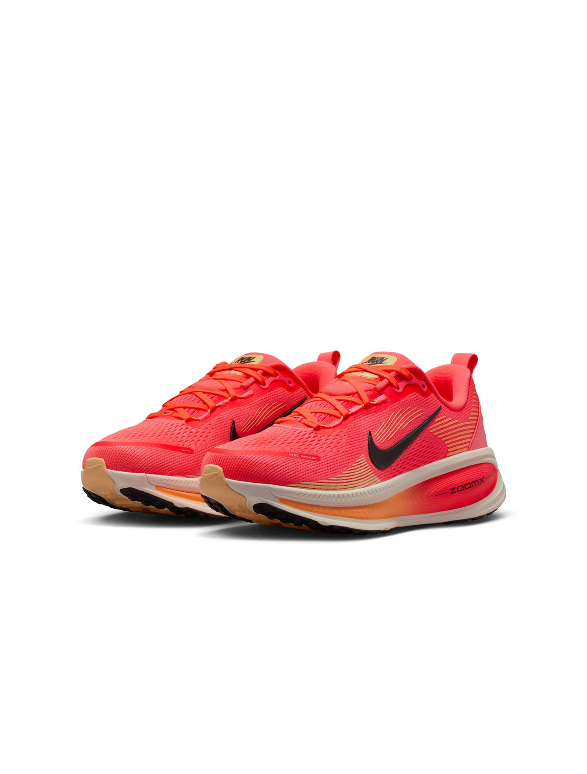 Nike Women's Vomero 18 running shoes in Hot Lava color, featuring lightweight design and breathable mesh for comfort.