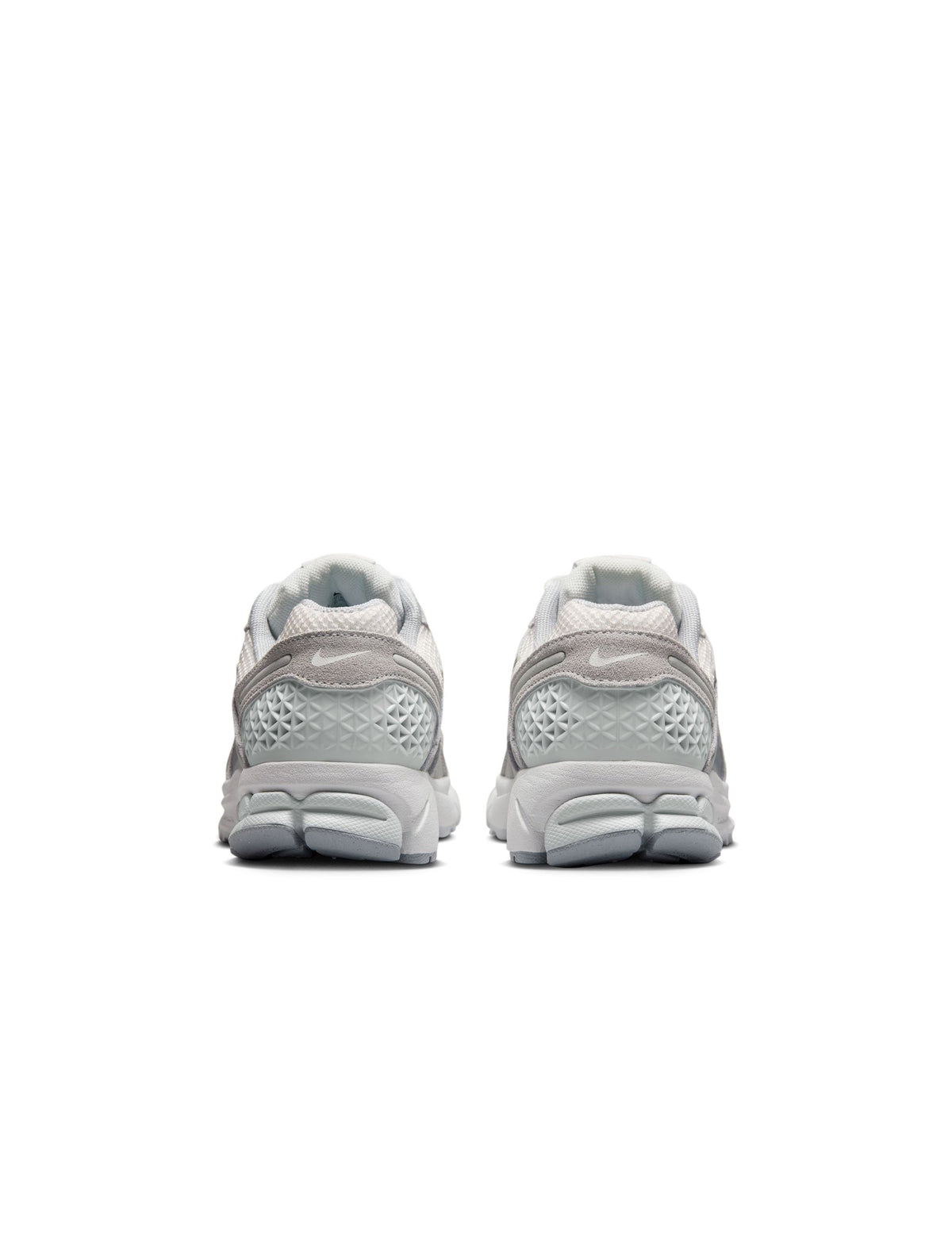 Nike Women's Zoom Vomero 5 running shoes in Pure Platinum, featuring a sleek design and breathable mesh upper.