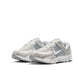 Nike Women's Zoom Vomero 5 running shoes in Pure Platinum, featuring sleek design and supportive cushioning, on a clean background.