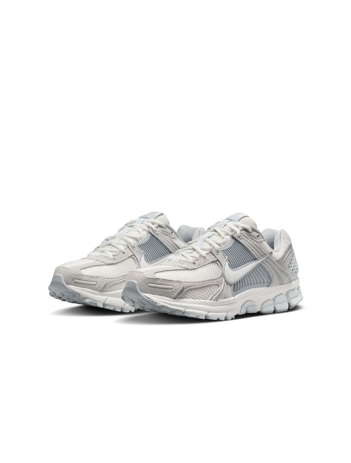 Nike Women's Zoom Vomero 5 running shoes in Pure Platinum, featuring sleek design and supportive cushioning, on a clean background.