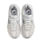 Nike Women's Zoom Vomero 5 sneakers in Pure Platinum color, featuring lightweight athletic design and breathable mesh upper.