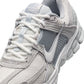 Nike Women's Zoom Vomero 5 running shoes in Pure Platinum with white and silver accents, designed for comfort and style.