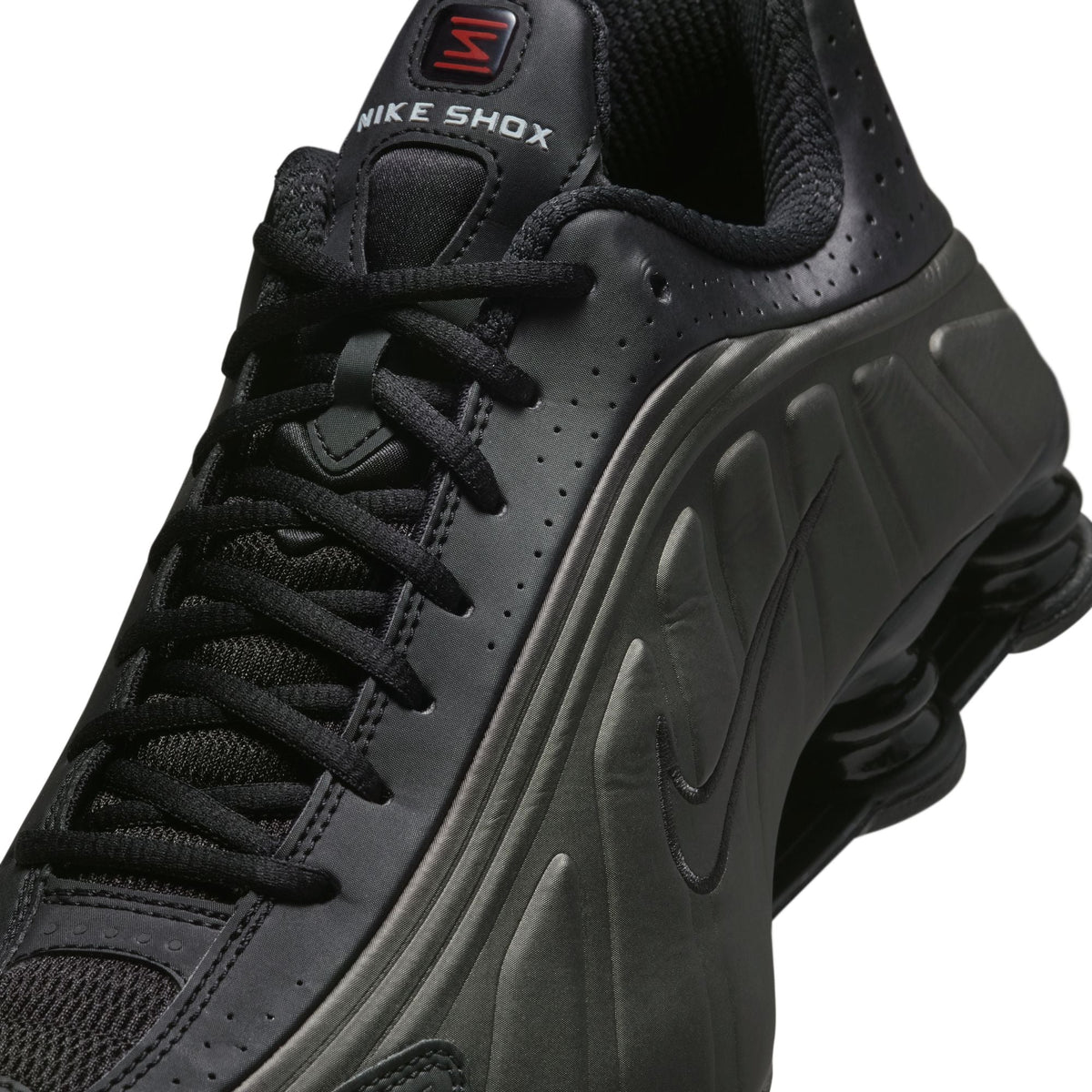 Black Nike men's Shox R4 sneakers from Denim Exchange