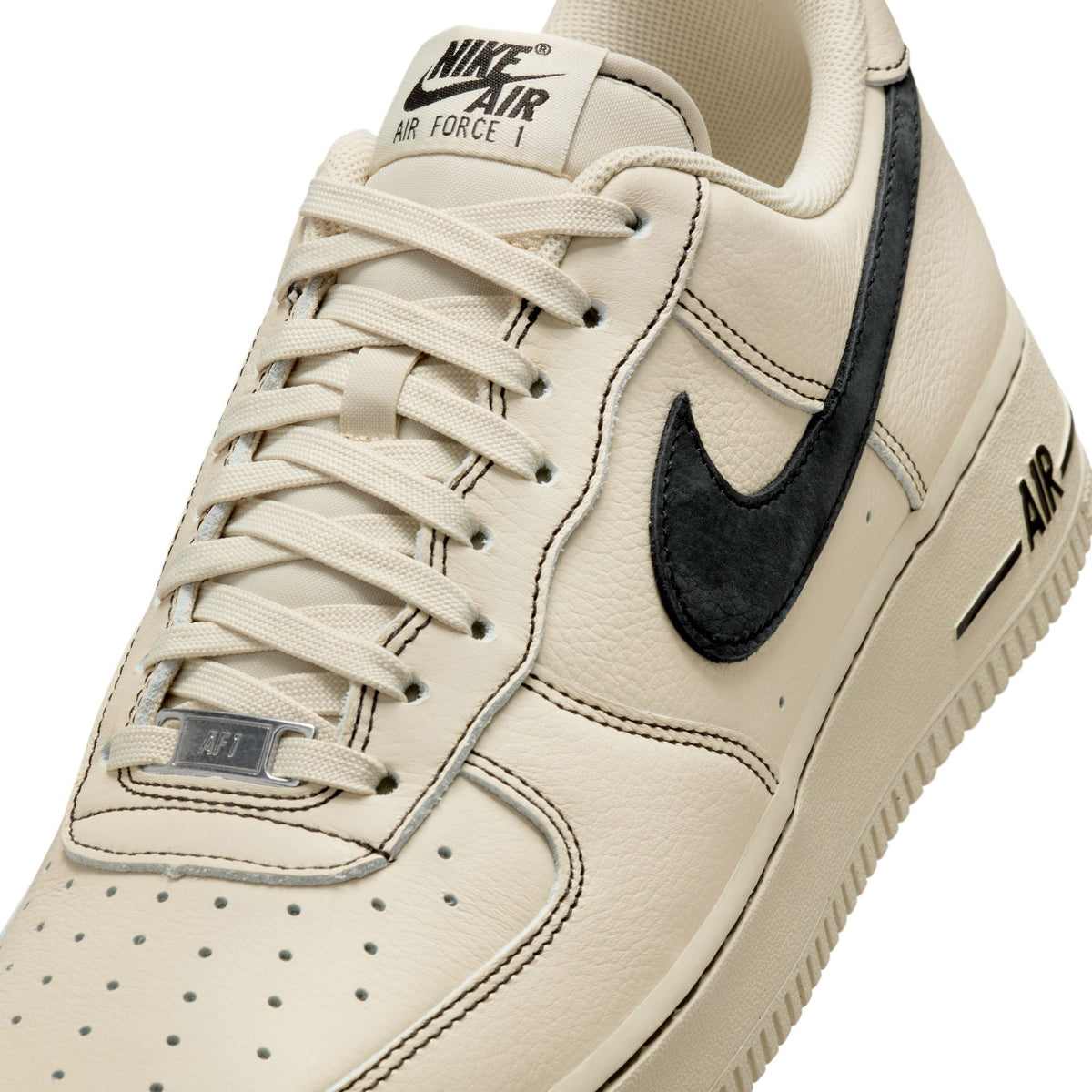 Nike men's Air Force 1 '07 LV8 sneakers in light khaki, side view